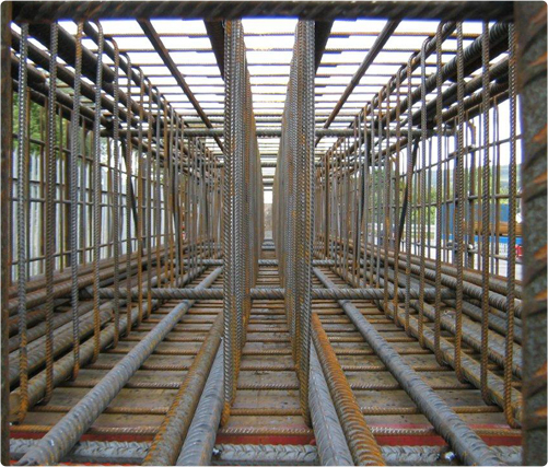 Steel structure featuring rods and pipes, showcasing prefabricated solutions for construction and infrastructure projects.