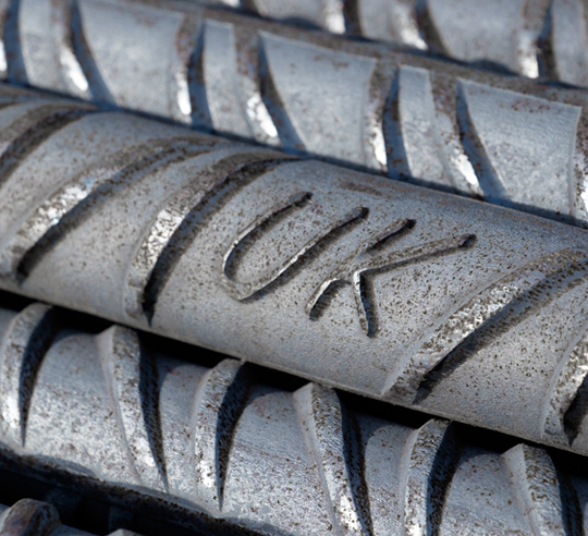 Close-up of a pile of steel reinforcing bars, used for tensioning in concrete and masonry structures.